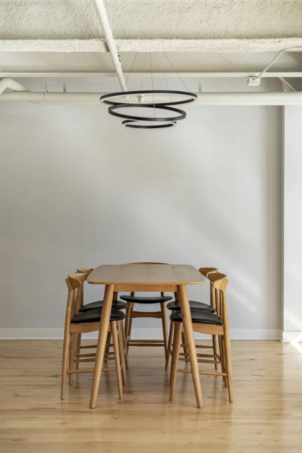 Wooden dining table with chairs