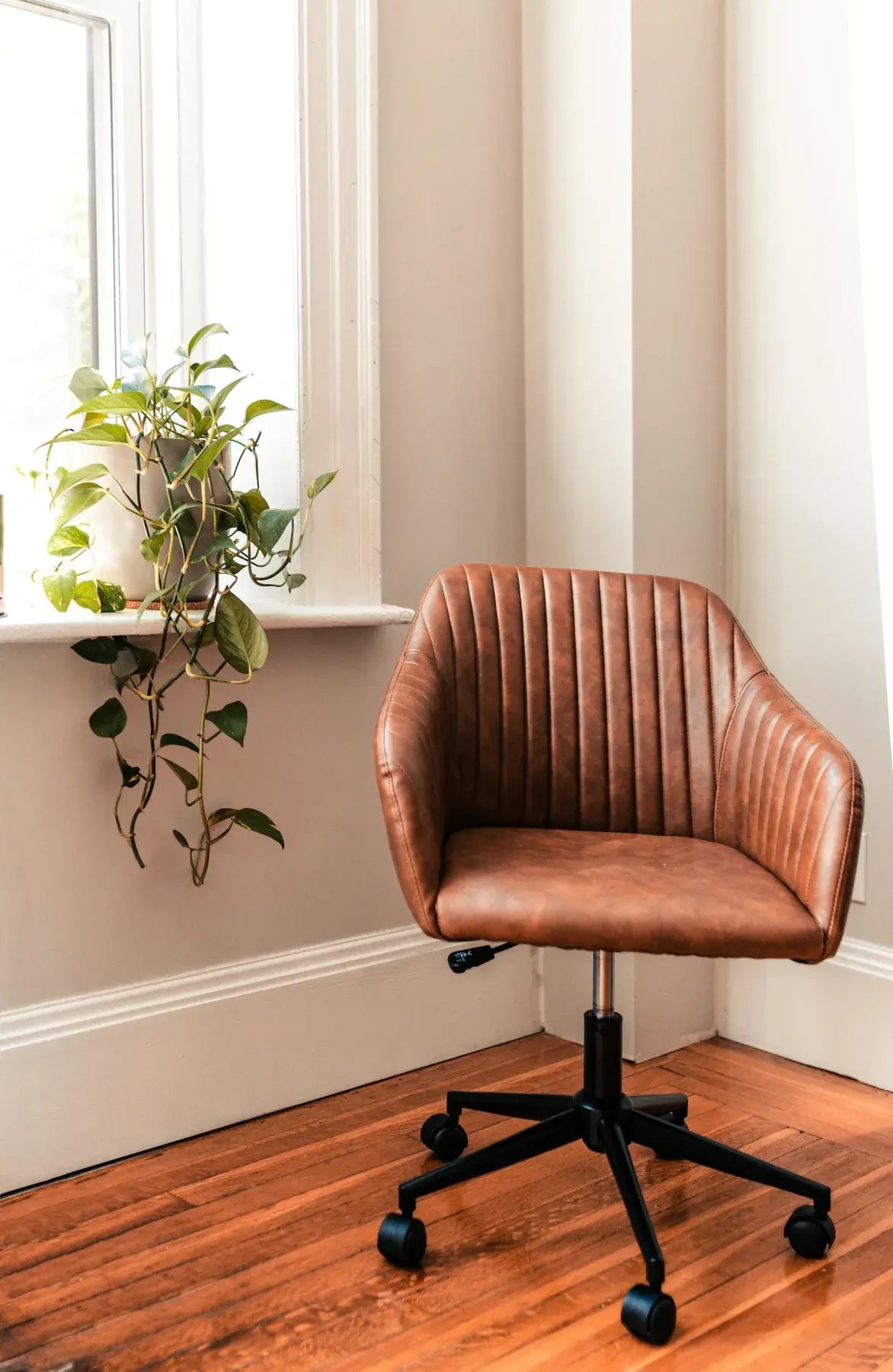 Tan leather swivel chair