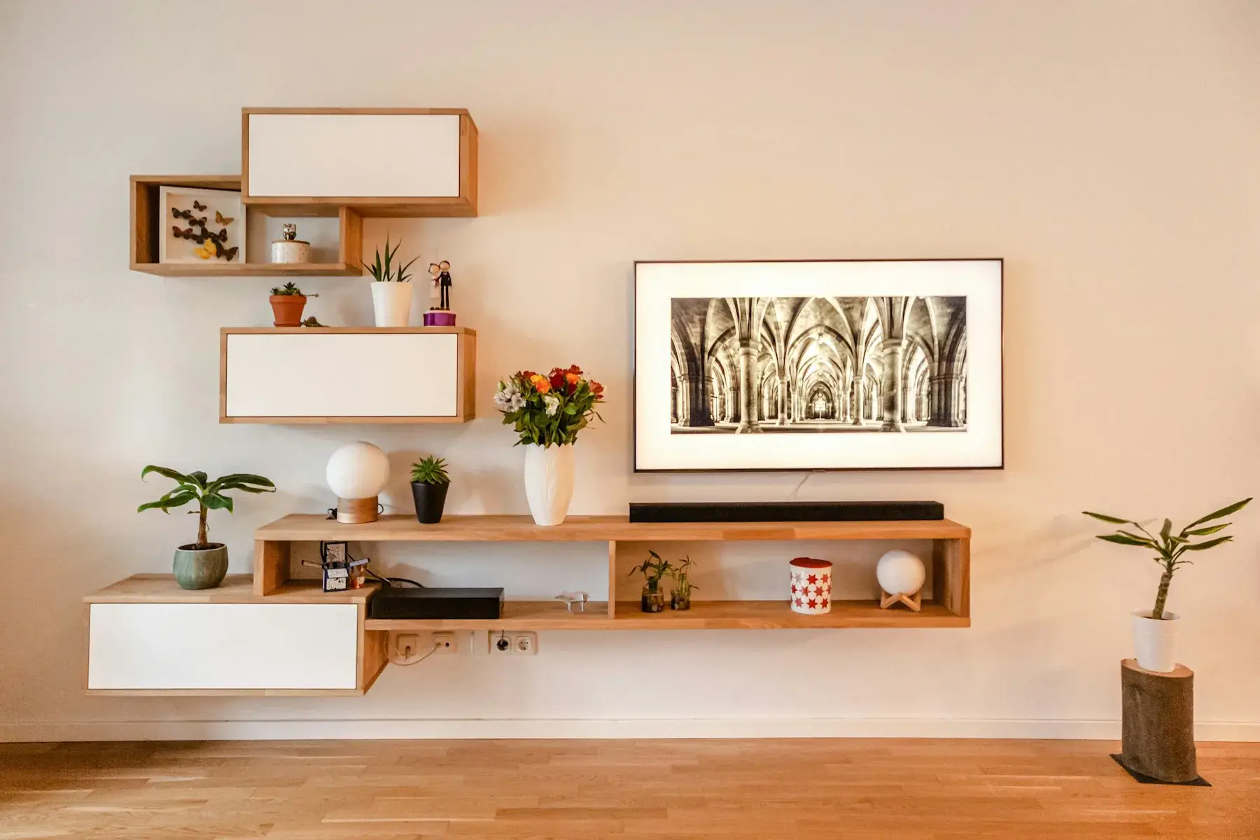 Wall-mounted TV unit with open shelves